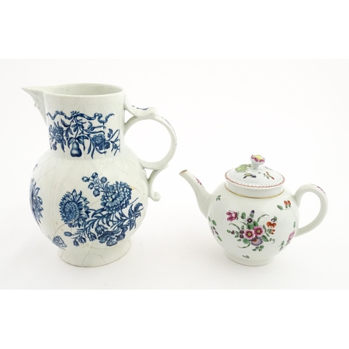 88 - A large 18thC Worcester blue and white sparrow beak jug decorated with flowers and butterflies. Toge... 
