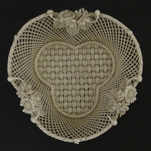 101 - Two Belleek three strand baskets of shamrock form with applied flower and leaf detail to rim. Both w... 