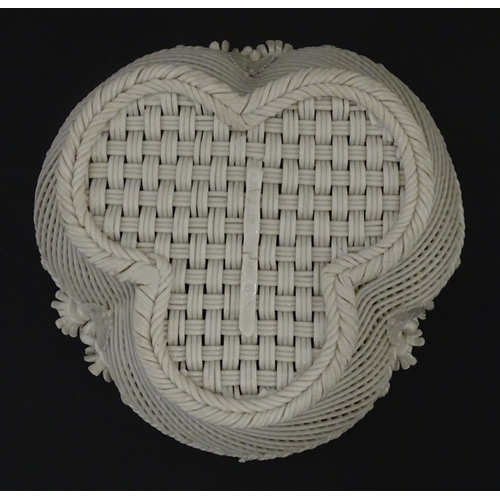101 - Two Belleek three strand baskets of shamrock form with applied flower and leaf detail to rim. Both w... 