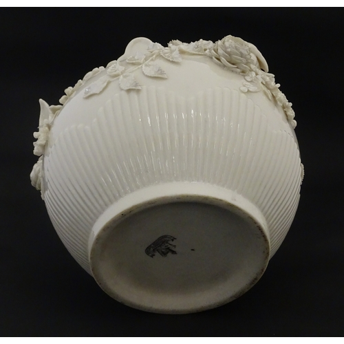 103 - A Belleek Rathmore jardiniere / planter decorated with birds, flowers and foliage. Marked with Secon... 
