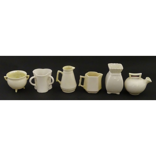 105 - Six Belleek crested china wares to include three for Limerick, one for Larne, Belfast and Dublin. Ea... 