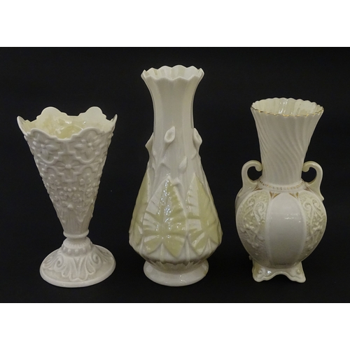 106 - Three Belleek vases to include a small Calla Lily Nile vase, a Shamrock spill vase of conical form, ... 