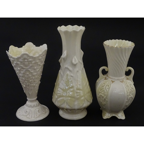 106 - Three Belleek vases to include a small Calla Lily Nile vase, a Shamrock spill vase of conical form, ... 