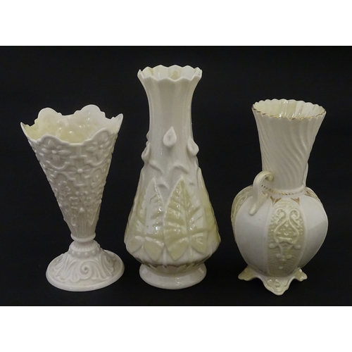 106 - Three Belleek vases to include a small Calla Lily Nile vase, a Shamrock spill vase of conical form, ... 