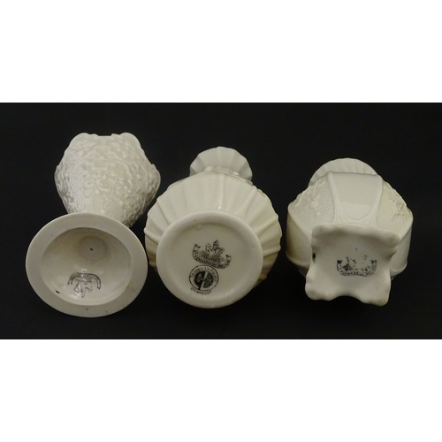 106 - Three Belleek vases to include a small Calla Lily Nile vase, a Shamrock spill vase of conical form, ... 