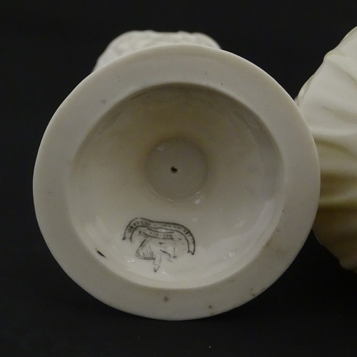 106 - Three Belleek vases to include a small Calla Lily Nile vase, a Shamrock spill vase of conical form, ... 