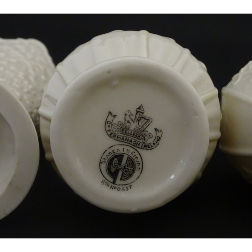 106 - Three Belleek vases to include a small Calla Lily Nile vase, a Shamrock spill vase of conical form, ... 