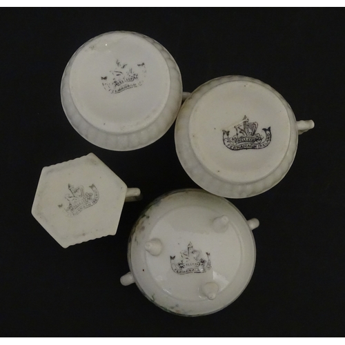 108 - Five items of Belleek porcelain decorated with hand painted shamrock detail to include a sugar bowl,... 
