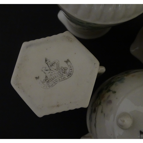 108 - Five items of Belleek porcelain decorated with hand painted shamrock detail to include a sugar bowl,... 
