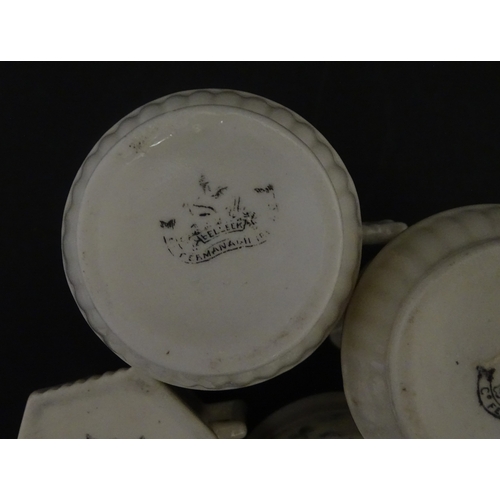 108 - Five items of Belleek porcelain decorated with hand painted shamrock detail to include a sugar bowl,... 