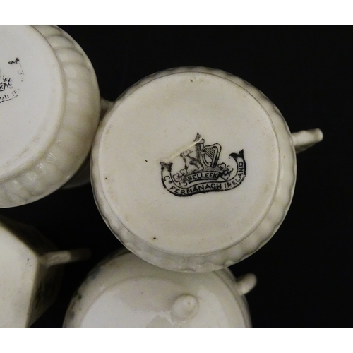 108 - Five items of Belleek porcelain decorated with hand painted shamrock detail to include a sugar bowl,... 