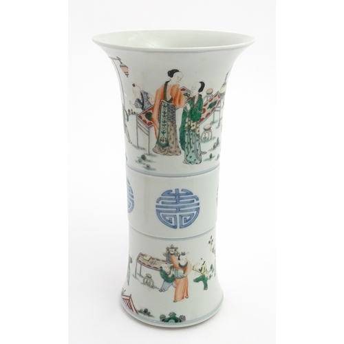 57 - A Chinese famille verte vase of Gu form decorated with figures, children playing and flying kites. A... 