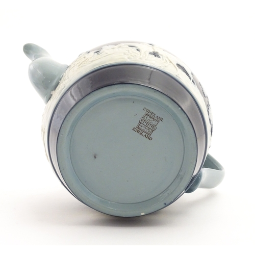 86 - A Copeland Spode jasperware teapot decorated with a hunting scene with horses and hounds. Marked und... 