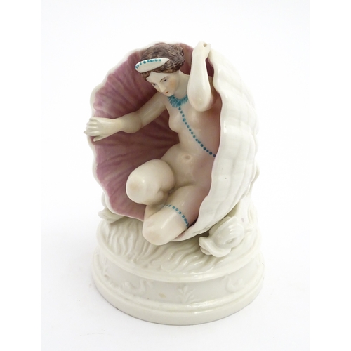 91 - An English figure modelled as the Birth of Venus / Venus emerging from a sea shell, with pink and bl... 