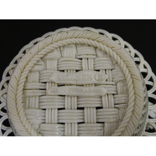 93 - A Belleek four strand basket with painted Forget-Me-Not flowers and leaves to rim. Bears First Perio... 