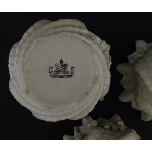 94 - Three small Belleek Neptune vases / jardinieres with applied flower and foliage decoration. Each bea... 