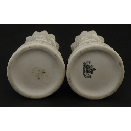 95 - A pair of Belleek Lily of the Valley spill vases. Both bearing Second Period marks under. Approx. 6 ... 