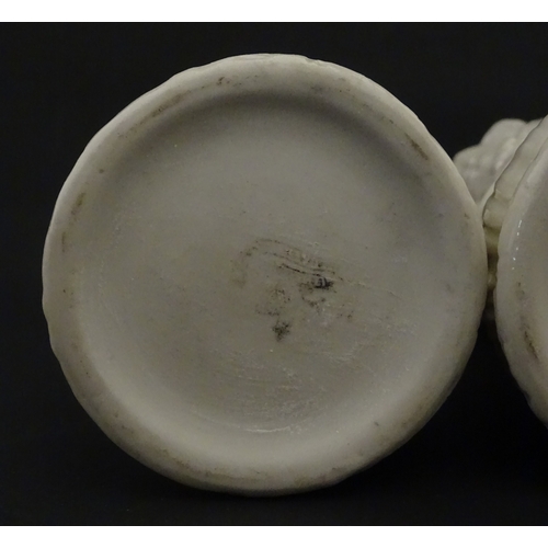 95 - A pair of Belleek Lily of the Valley spill vases. Both bearing Second Period marks under. Approx. 6 ... 