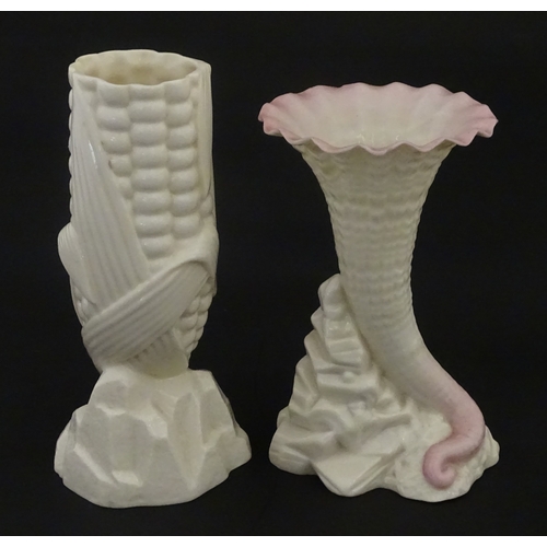 97 - A Belleek Indian Corn spill vase, with First Period mark under. Together with a Belleek Rock spill v... 