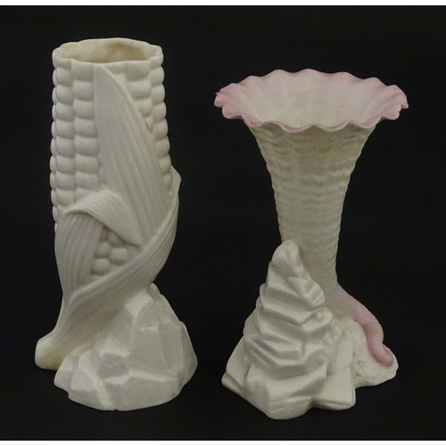 97 - A Belleek Indian Corn spill vase, with First Period mark under. Together with a Belleek Rock spill v... 