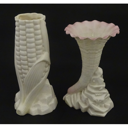 97 - A Belleek Indian Corn spill vase, with First Period mark under. Together with a Belleek Rock spill v... 