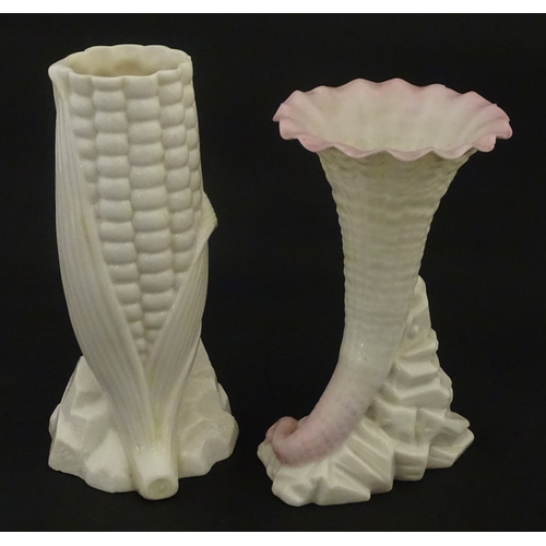 97 - A Belleek Indian Corn spill vase, with First Period mark under. Together with a Belleek Rock spill v... 