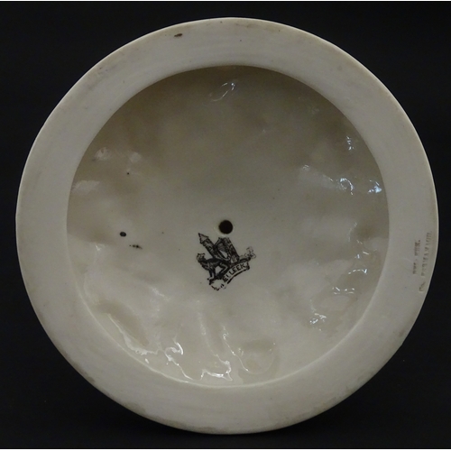 98 - A Belleek Nautilus Shell comport / centrepiece vase with stylised coral base. Bearing First Period m... 