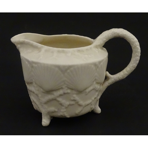 99 - Six Belleek wares in the New Shell Yellow pattern to include plate, milk jug, tray and dishes. To in... 