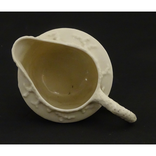 99 - Six Belleek wares in the New Shell Yellow pattern to include plate, milk jug, tray and dishes. To in... 