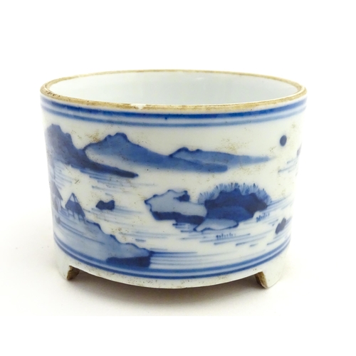 76 - A Chinese blue and white censer raised on three feet and decorated with a river landscape. Approx. 2... 