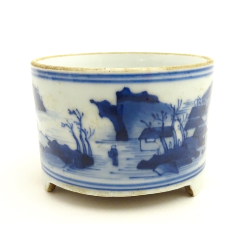 76 - A Chinese blue and white censer raised on three feet and decorated with a river landscape. Approx. 2... 