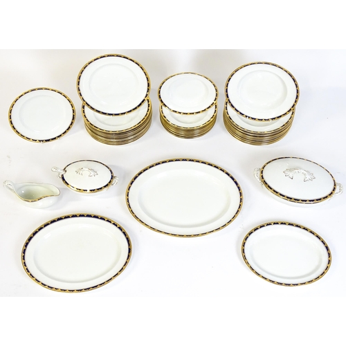 172 - A quantity of Alfred Meakin dinner wares decorated in the Bleu de Roi pattern comprising plates, dis... 