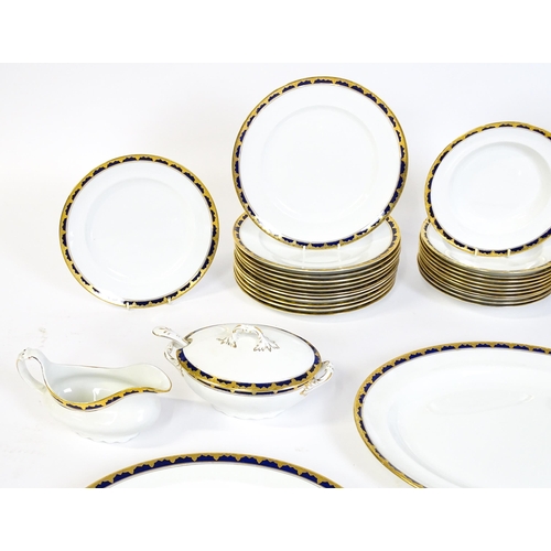 172 - A quantity of Alfred Meakin dinner wares decorated in the Bleu de Roi pattern comprising plates, dis... 
