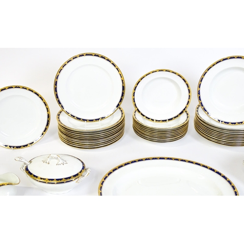 172 - A quantity of Alfred Meakin dinner wares decorated in the Bleu de Roi pattern comprising plates, dis... 