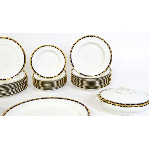 172 - A quantity of Alfred Meakin dinner wares decorated in the Bleu de Roi pattern comprising plates, dis... 