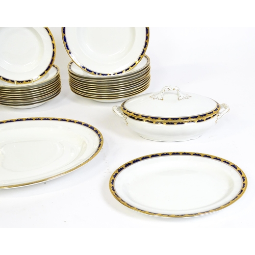 172 - A quantity of Alfred Meakin dinner wares decorated in the Bleu de Roi pattern comprising plates, dis... 