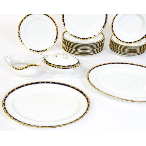 172 - A quantity of Alfred Meakin dinner wares decorated in the Bleu de Roi pattern comprising plates, dis... 