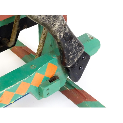 6 - Toy: A 20thC carved wooden rocking horse with hand painted decoration by Norman Dibben of Amersham, ... 