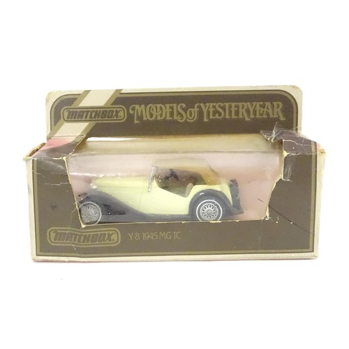 55 - Toys: A quantity of die cast scale model vehicles to include a Matchbox Models of Yesteryear Y-8 194... 