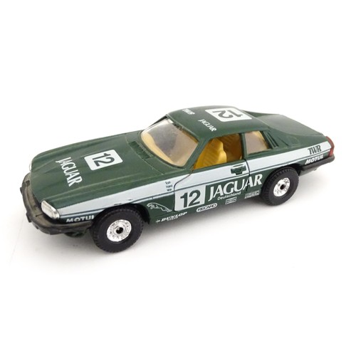 55 - Toys: A quantity of die cast scale model vehicles to include a Matchbox Models of Yesteryear Y-8 194... 