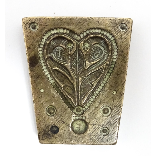 380 - Three Indian cast bronze jeweller's moulds, two having floral and foliate detail, and one of roundel... 