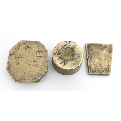 380 - Three Indian cast bronze jeweller's moulds, two having floral and foliate detail, and one of roundel... 