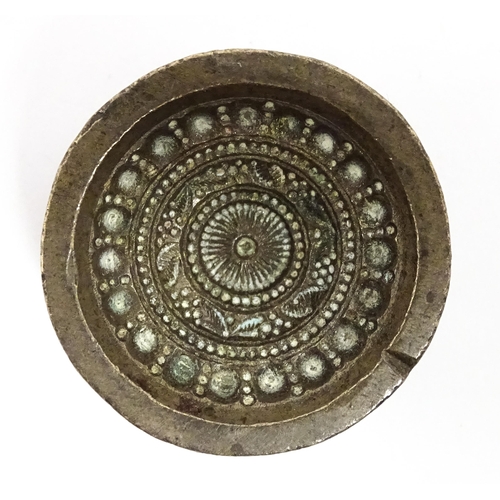380 - Three Indian cast bronze jeweller's moulds, two having floral and foliate detail, and one of roundel... 