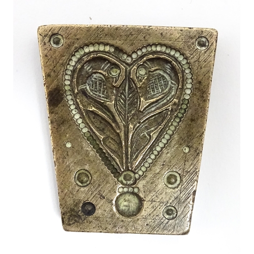 380 - Three Indian cast bronze jeweller's moulds, two having floral and foliate detail, and one of roundel... 