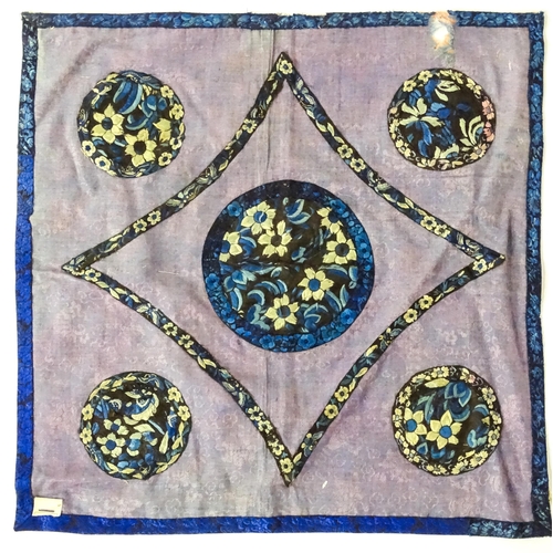 31 - A quantity of assorted textiles to include a 20thC needlework sample with letters of the alphabet by... 