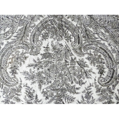 31 - A quantity of assorted textiles to include a 20thC needlework sample with letters of the alphabet by... 