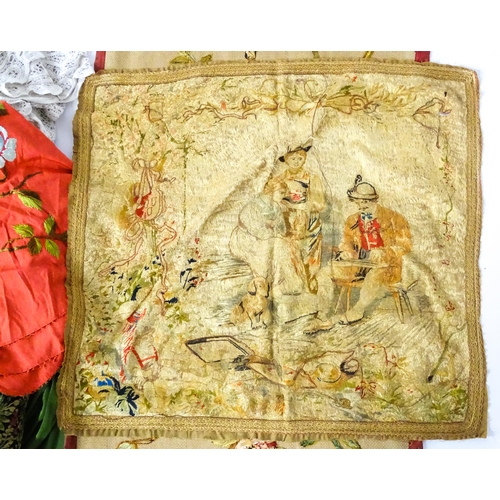 31 - A quantity of assorted textiles to include a 20thC needlework sample with letters of the alphabet by... 