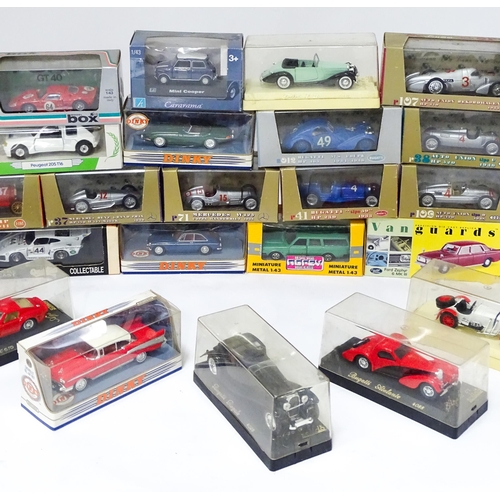 651 - Toys: A quantity of assorted boxed die cast scale model vehicles to include Matchbox Dinky Collectio... 