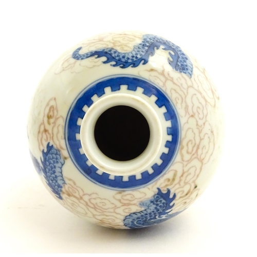 27 - A Chinese blue and white vase decorated with dragons, flaming pearl, phoenix birds and stylised clou... 