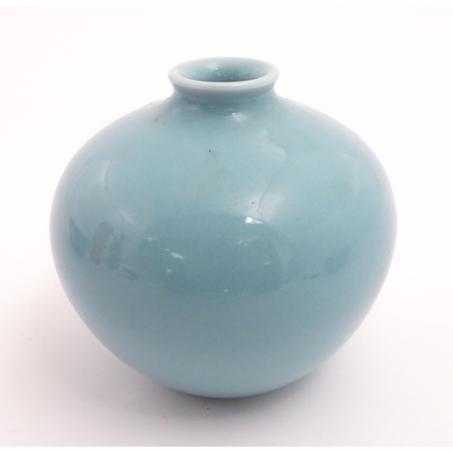 28 - A Chinese vase of squat form with turquoise ground. Character marks under. Approx. 4 3/4